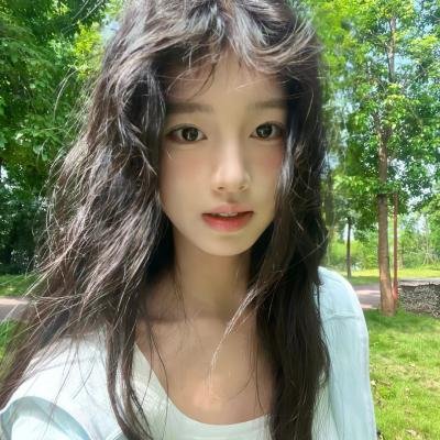 桃花含露又春风